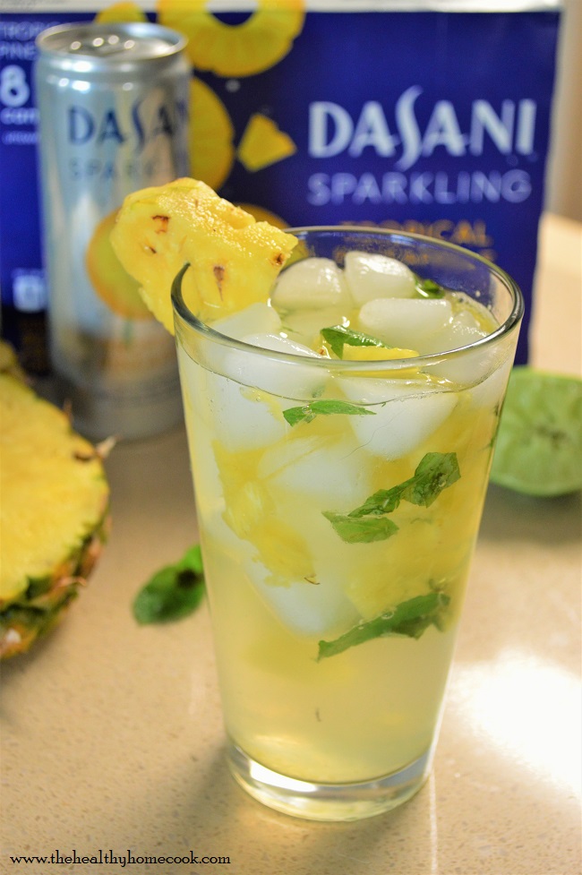 Sparkling Tropical Mojito Mocktail- This revamped version is the ultimate summer drink for anyone who is watching their weight, but still wants to enjoy a fun fruity sip.