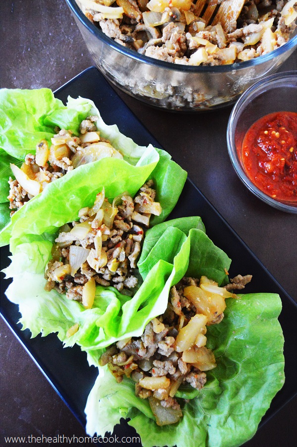With crisp lettuce, a flavorful filling and a spicy topping, your life with never be the same with these Asian Turkey Lettuce Wraps.