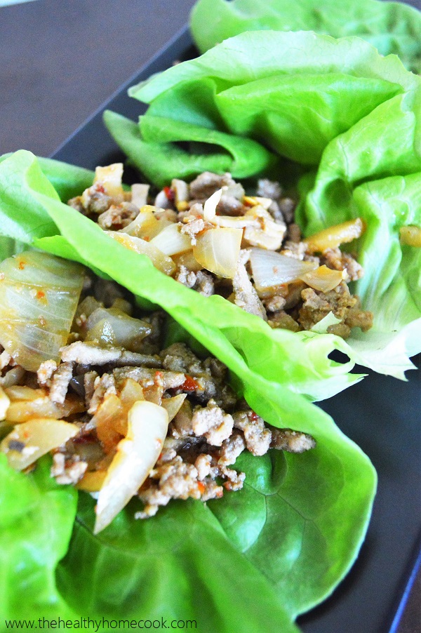 With crisp lettuce, a flavorful filling and a spicy topping, your life with never be the same with these Asian Turkey Lettuce Wraps.