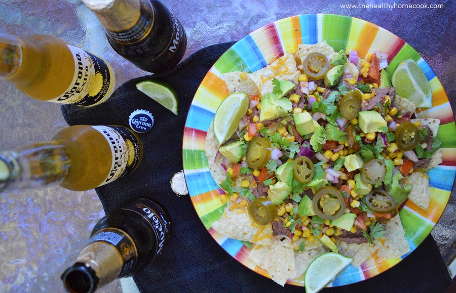 This recipe for Ultimate Vegan Nachos is the perfect addition to your Cinco de Mayo party!