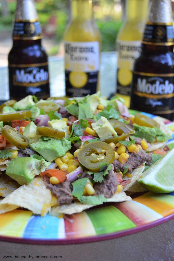 This recipe for Ultimate Vegan Nachos is the perfect addition to your Cinco de Mayo party!