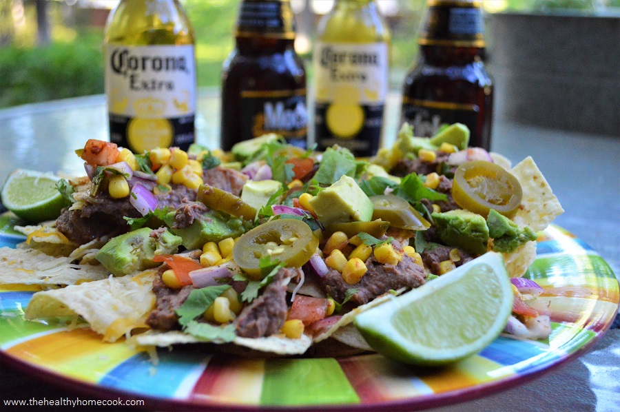 This recipe for Ultimate Vegan Nachos is the perfect addition to your Cinco de Mayo party!