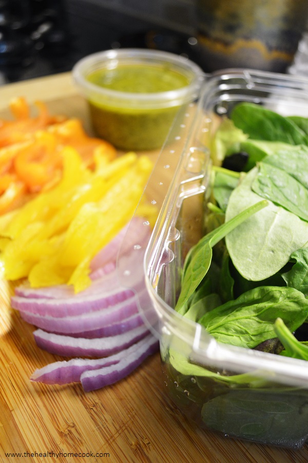 This fresh and fit Grilled Chicken Pesto Wrap is a tasty way to enjoy your lunch break today!