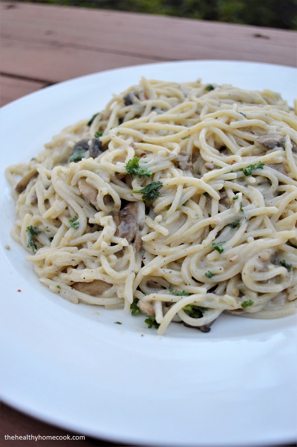 Tender mushrooms coated in a flavorful garlic-herb sauce tossed with gluten free pasta. This recipe is a must make!