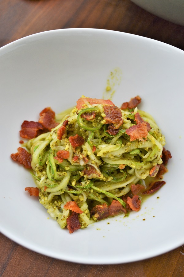 Pesto Zucchini Noodles with Bacon- Only 4 ingredients and 20 minutes to make a delicious zucchini noodle dish your whole family will love!