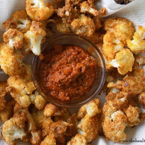 Trust me, it will be in your best interest to make a couple batches of this Oven Roasted Crunchy Cauliflower. People will be grabbing these by the handful.