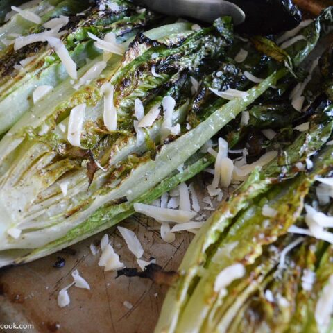 Trust me, you will be glad you didn't put your grills away once you try this Grilled Romaine Salad.