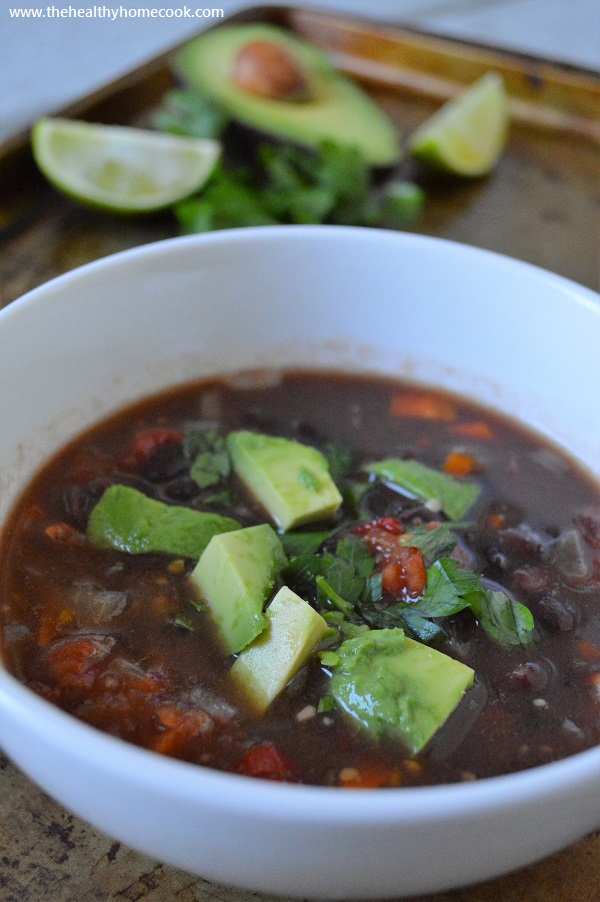 This easy recipe for {Slow Cooker} Smokey Black Bean Soup is the perfect way to relax after a long hectic day.  Give yourself a break on dinner this week and let the crock pot do all the work!