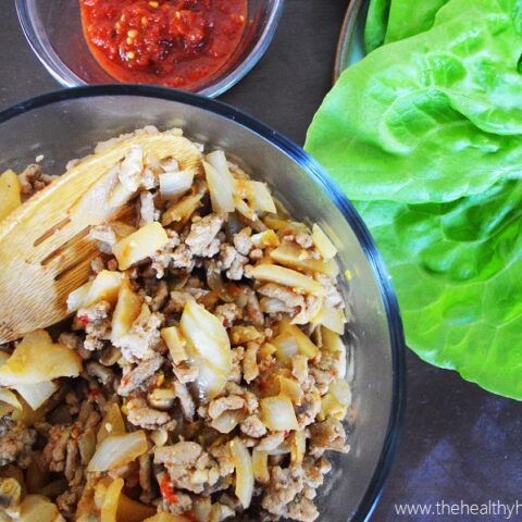 With crisp lettuce, a flavorful filling and a spicy topping, your life with never be the same with these Asian Turkey Lettuce Wraps.