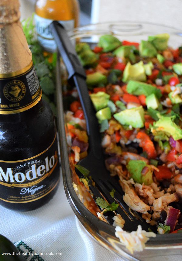 This Skinny Mexican Casserole has layer upon layer of deliciously fresh and colorful ingredients. It's easy to make, rich in flavor and will please everyone at your party.  