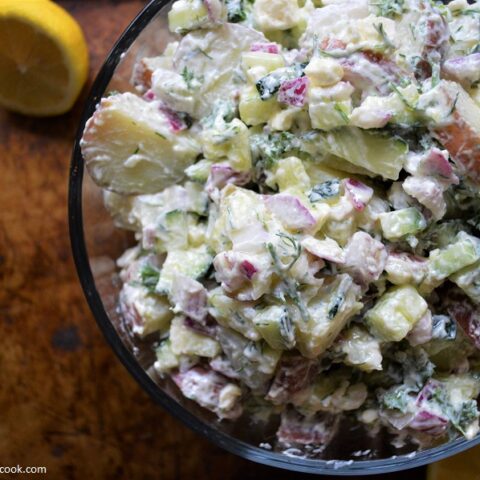 What happens when you add Greek flavors to an all-American side dish? You get this INSANELY delicious Tzaztiki Potato Salad!