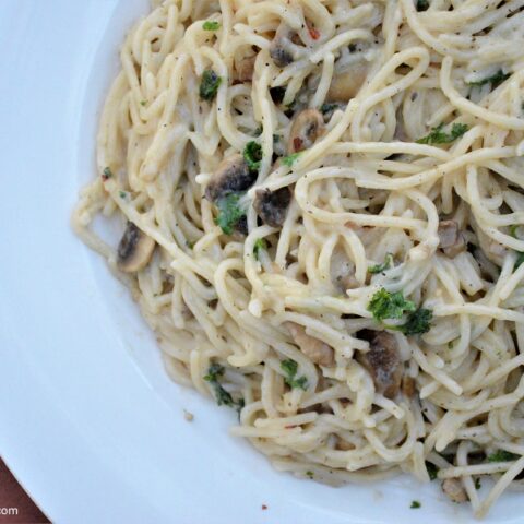 Tender mushrooms coated in a flavorful garlic-herb sauce tossed with gluten free pasta. This recipe is a must make!