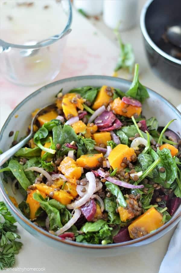 This delicious salad is loaded with tender butternut squash, fresh spinach, nutty lentils and finished with a honey dijon dressing. It's full of protein, easy to make, and so nourishing!