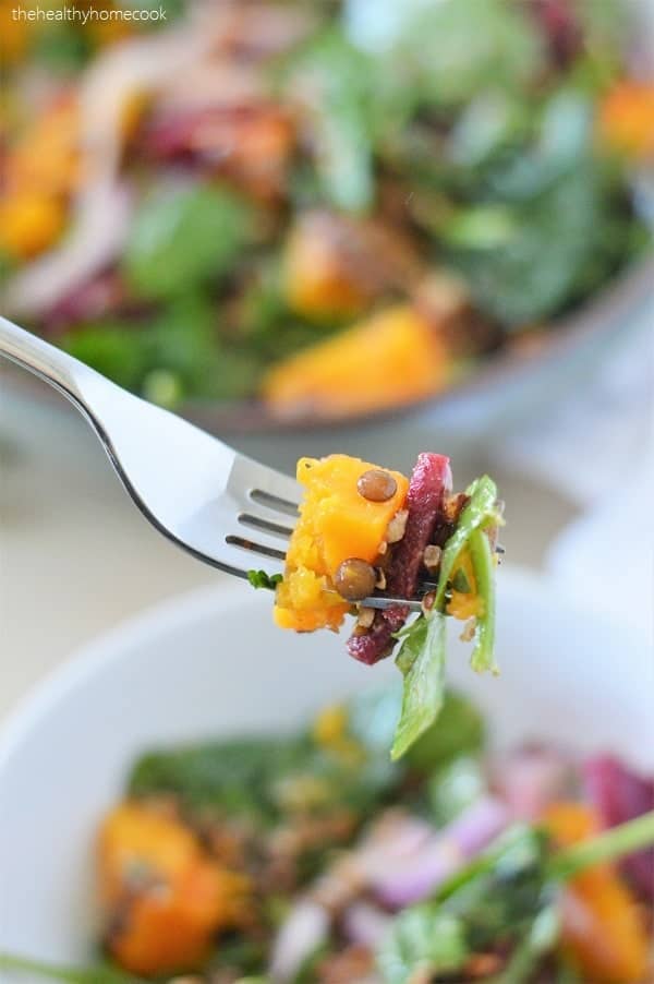 This delicious salad is loaded with tender butternut squash, fresh spinach, nutty lentils and finished with a honey dijon dressing. It's full of protein, easy to make, and so nourishing!