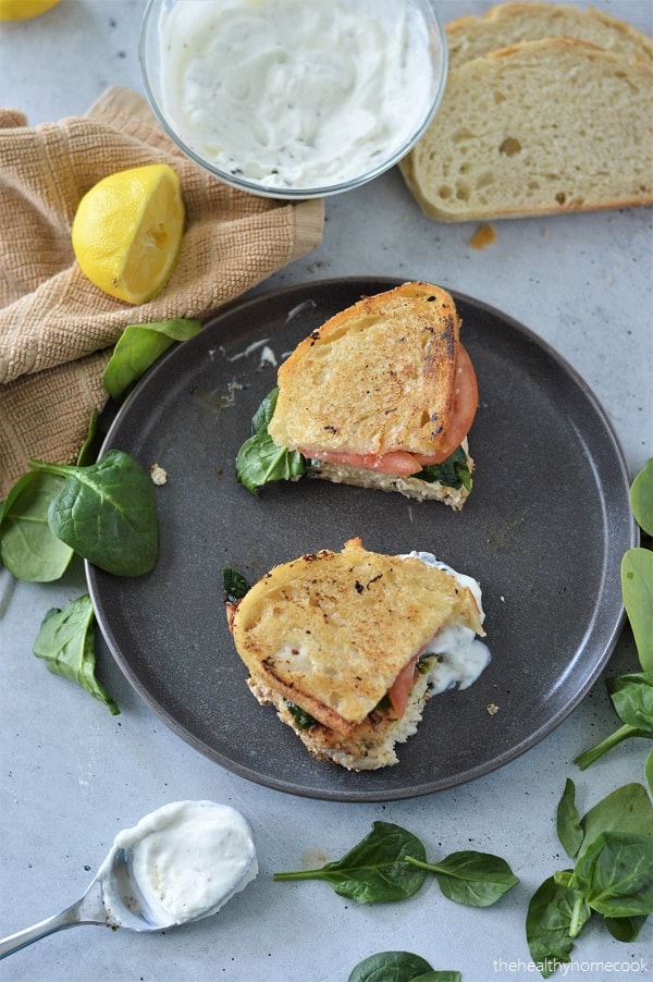 This roasted turkey sandwich with fresh tomatoes, spinach and a delicious creamy spread is incredibly flavorful and perfect all year round.
