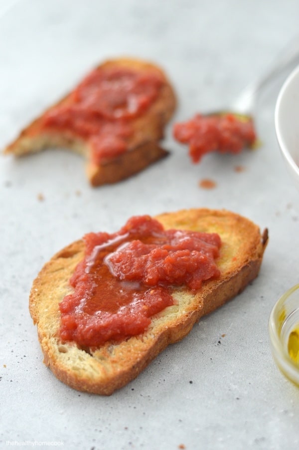 Pan Con Tomate is a Spanish tomato toast that is simple but incredibly delicious. It's a quick 4 ingredient recipe everyone will love.
