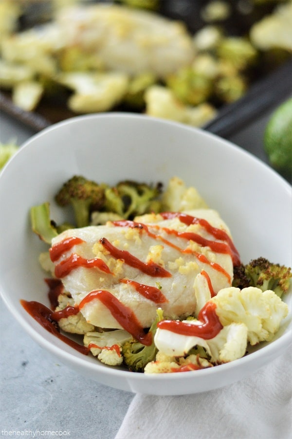 This Roasted Cod with Broccoli & Cauliflower recipe calls for all the ingredients to go into one pan then into the oven; easy and delicious!