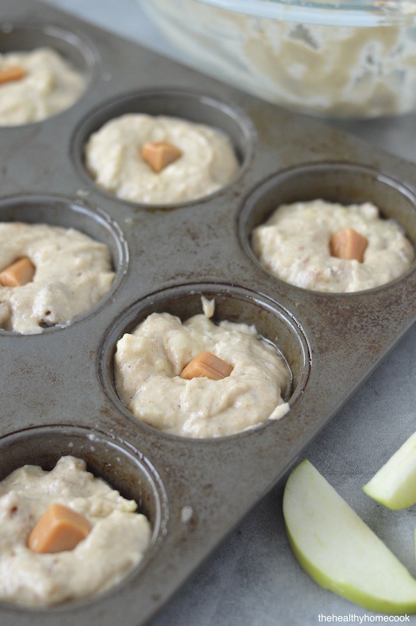 These Gluten Free Caramel Apple Muffins are perfectly fluffy and sweet..but not too sweet. They are my new favorite autumn goodie to warm up with.