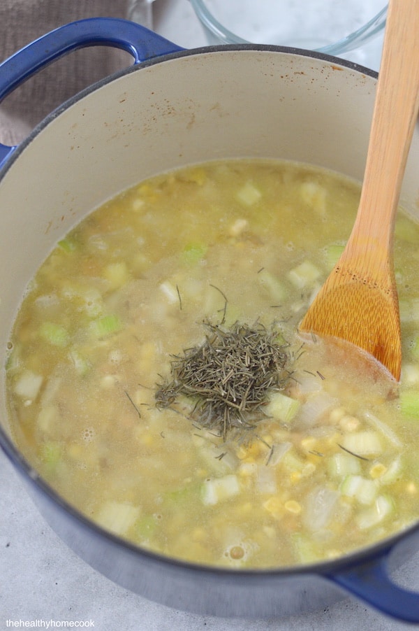 There is no better way to warm up a cold winter night than with this simple and delicious Rosemary Corn Soup.
