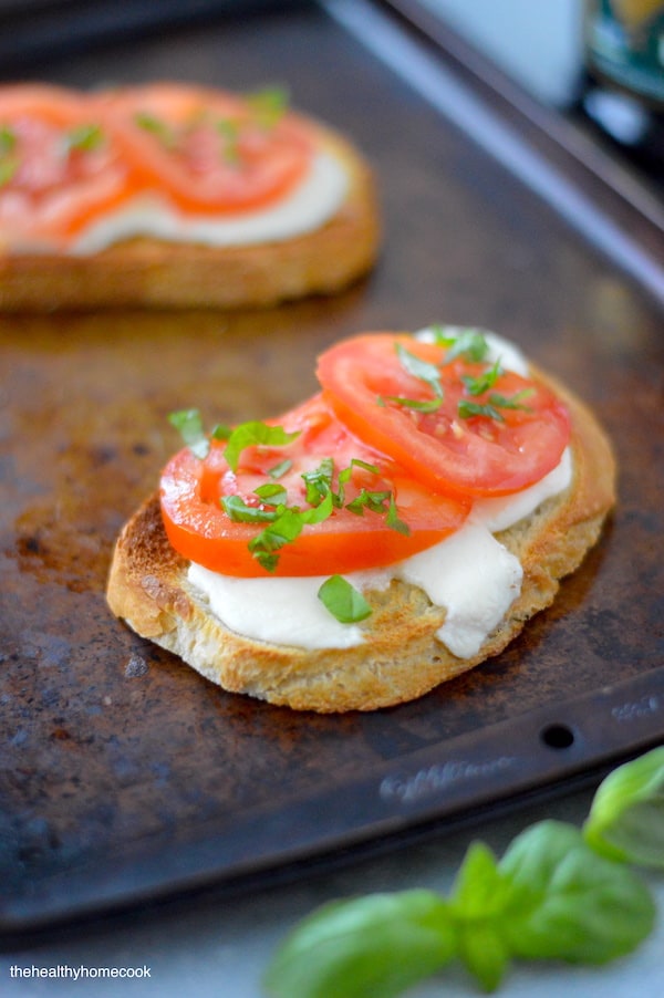 Grilled Caprese Toast. Charred rustic toast, topped with melted mozzarella, fresh tomatoes and a drizzle of balsamic. Perfect all year!