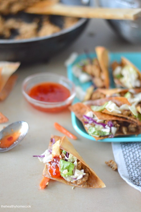 Crispy baked wontons filled with seasoned turkey and topped with store-bought asian salad mix. This is an easy recipe everyone will love!