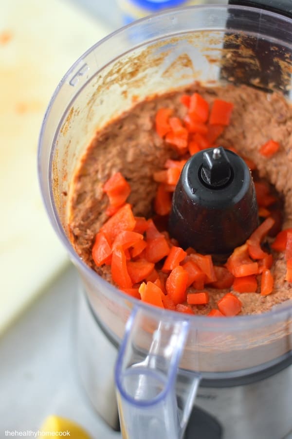 This Roasted Red Pepper Bean Dip is perfectly creamy, smoky, and just a little bit spicy!  This dip is so addicting!
