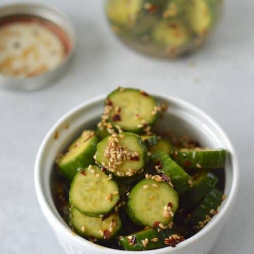 Marinated Asian Cucumbers: Light, refreshing, and vibrant in flavor. This super fast dish makes a great side to any Asian inspired meal.