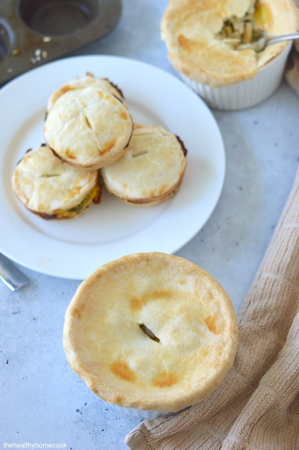 Learn how to make flaky, flavorful, Mini Chicken Pot Pies not one, but TWO different ways. Your family will love this easy, comforting meal!