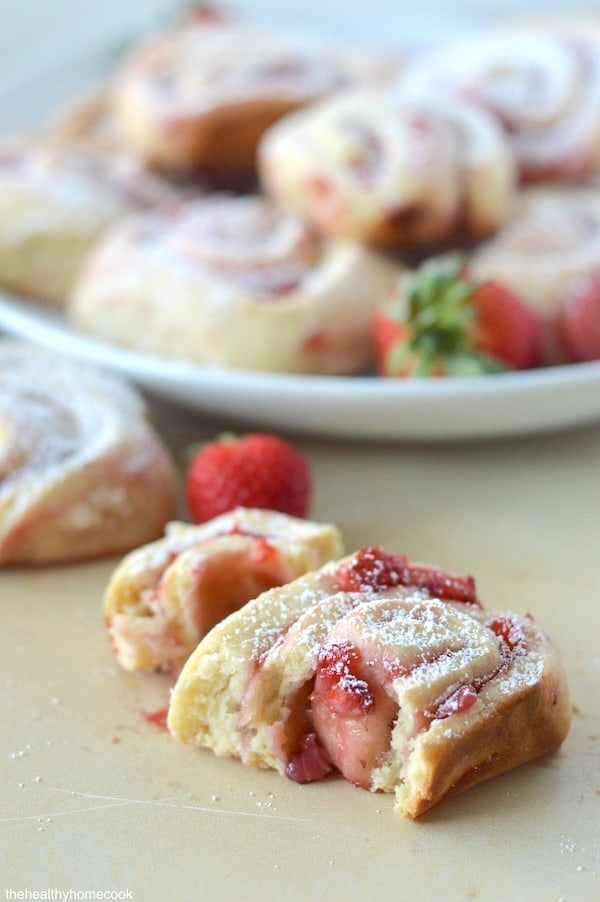 Strawberry Sweet Rolls are perfect for brunch or any holiday. Each roll is fluffy, fruity, and dusted with a light layer of powdered sugar.