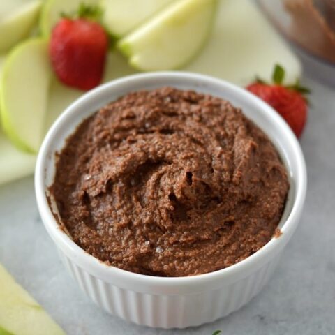 This recipe for Chocolate Hummus is perfect for dipping with your favorite fruit or crackers. Creamy, decadent, and addictive!