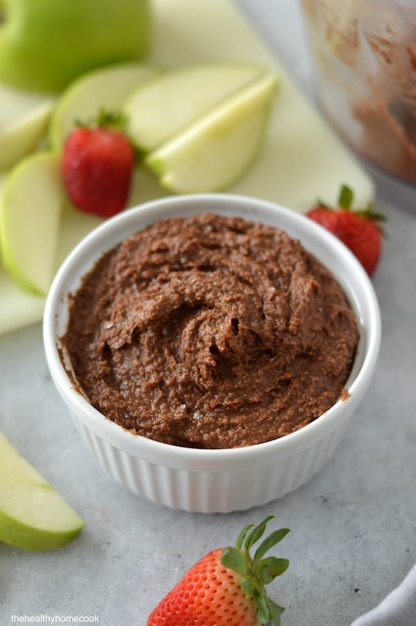 This recipe for Chocolate Hummus is perfect for dipping with your favorite fruit or crackers. Creamy, decadent, and addictive!