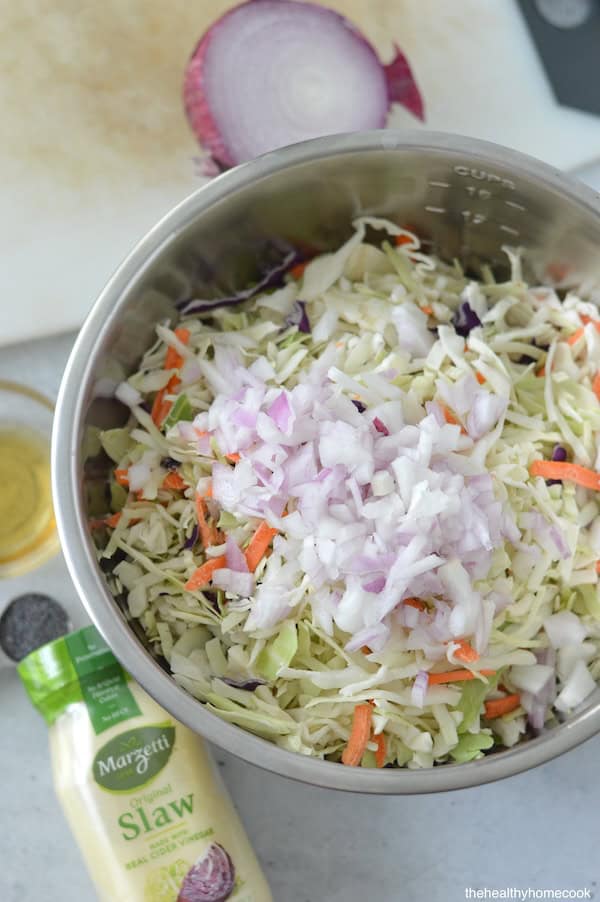 This Easy Homemade Coleslaw is great for summer parties and potlucks. It’s crunchy, creamy, tangy and so delicious without being too heavy.