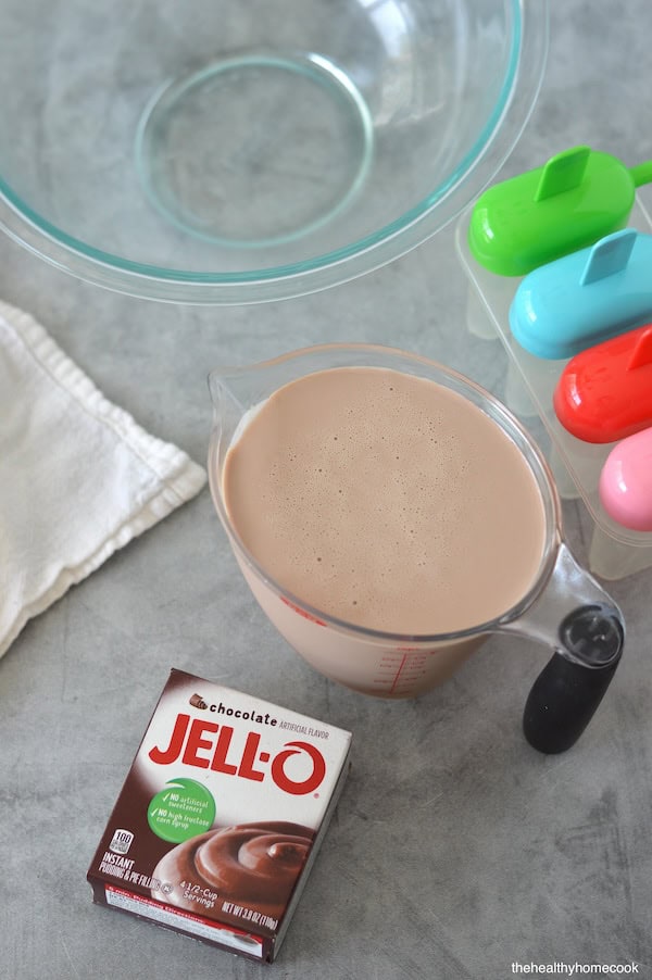 This 2 ingredient recipe for homemade Fudgesicles is an easy summer treat everyone will enjoy! Rich, creamy, and extra chocolatey.