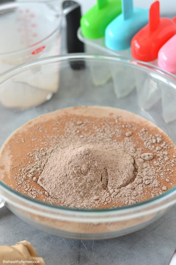 This 2 ingredient recipe for homemade Fudgesicles is an easy summer treat everyone will enjoy! Rich, creamy, and extra chocolatey.