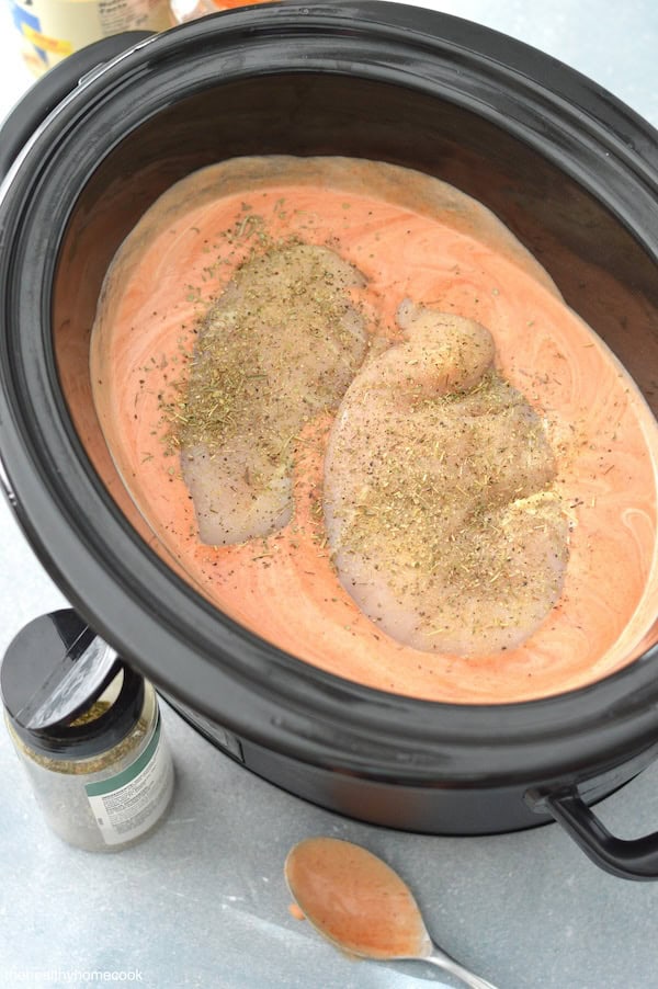 Indulge in the creamy goodness of this Slow Cooker Creamy Tomato Chicken & Pasta recipe. A comfort food recipe the whole family loves.