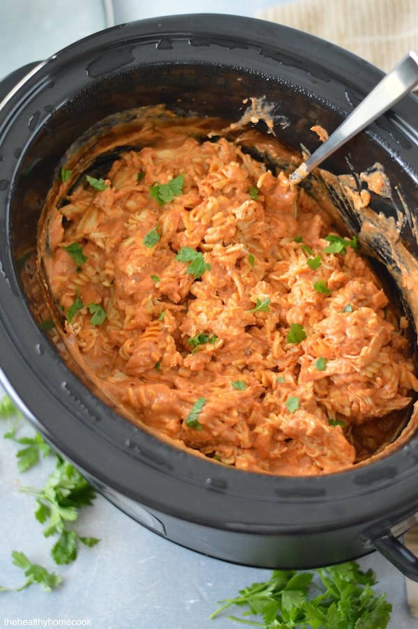 Indulge in the creamy goodness of this Slow Cooker Creamy Tomato Chicken & Pasta recipe. A comfort food recipe the whole family loves.