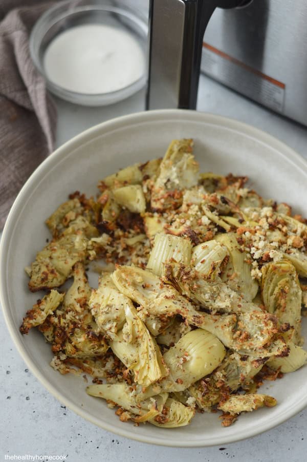 You have to make these mouthwatering Air Fryer Artichoke Hearts. Lightly breaded, golden brown, and ready in less than 10 minutes!