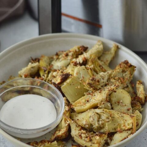 You have to make these mouthwatering Air Fryer Artichoke Hearts. Lightly breaded, golden brown, and ready in less than 10 minutes!