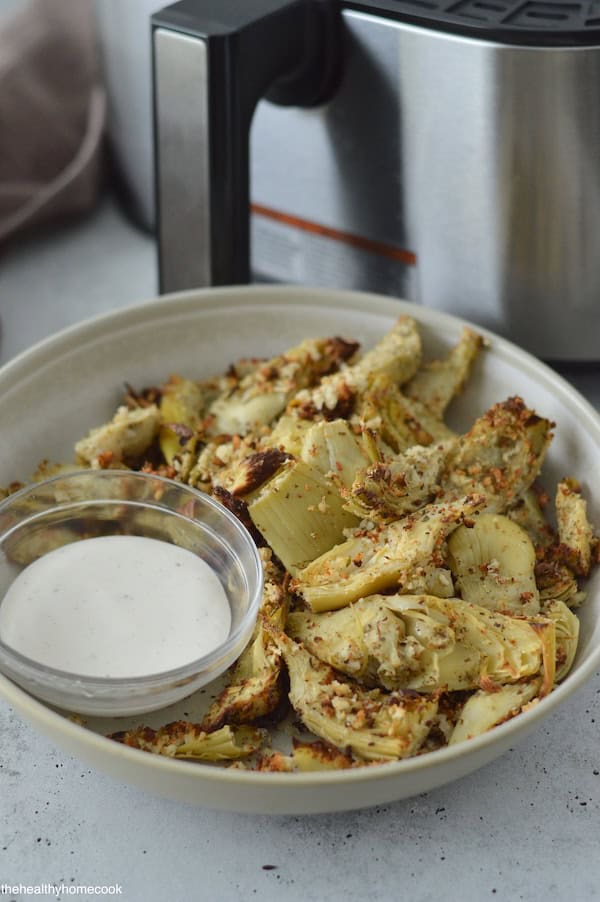 You have to make these mouthwatering Air Fryer Artichoke Hearts. Lightly breaded, golden brown, and ready in less than 10 minutes!