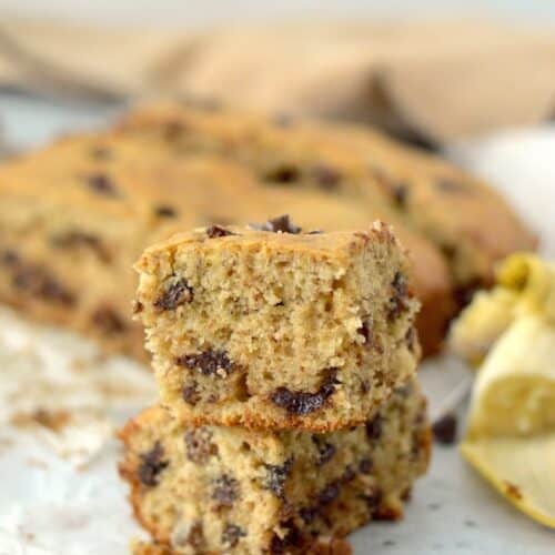 Moist and flavorful banana bread bars, packed with deep banana taste, chocolate chips and nuts. This is one recipe you won't want to miss!