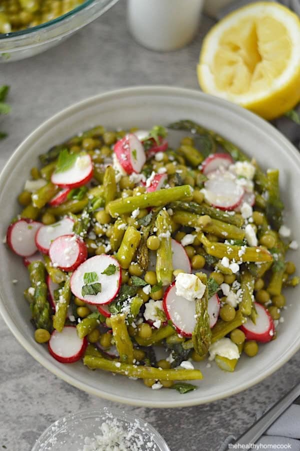 This Spring Pea & Asparagus Salad is the only summer salad recipe you will ever need. Easy to make and bursting with flavor, it's a must-try.