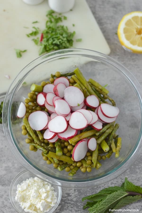 This Spring Pea & Asparagus Salad is the only summer salad recipe you will ever need. Easy to make and bursting with flavor, it's a must-try.