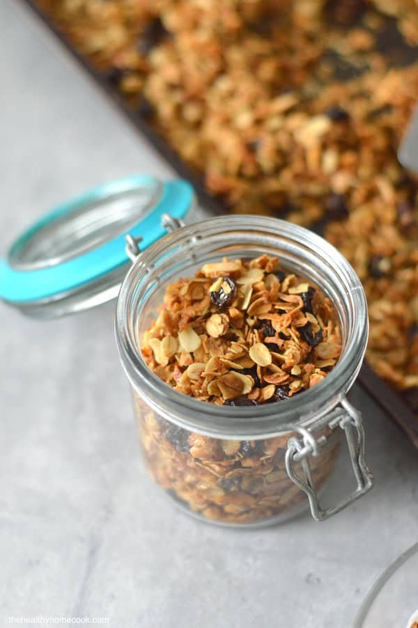 Grab this easy recipe now! My Almond Coconut Granola is perfect over Greek yogurt, fruit, or just to snack on at work.