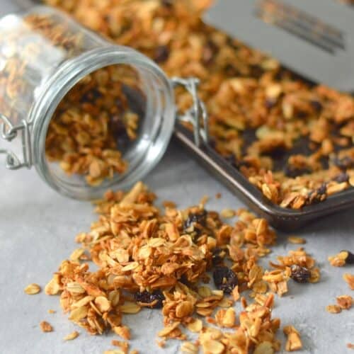 Grab this easy recipe now! My Almond Coconut Granola is perfect over Greek yogurt, fruit, or just to snack on at work.