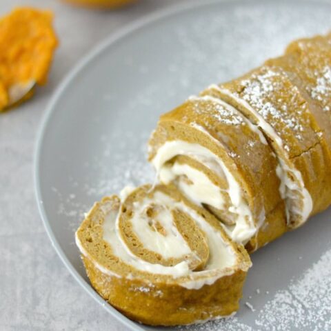 This Gluten Free Pumpkin Roll cake is soft, fluffy, and full of warm fall flavor. It's the perfect fall treat!