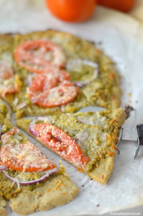 Make pizza night extra special with this Pesto Pizza with Chickpea Crust. It's easy to make and full of flavor!