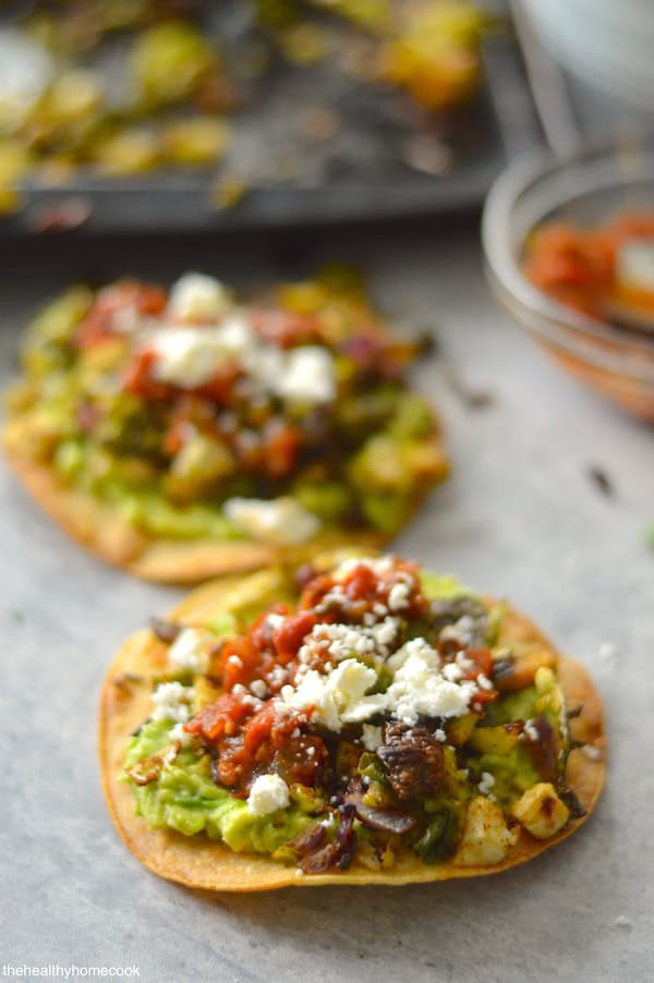 Crunchy, spicy and fresh, these Brussels Sprouts Tostadas are sure to become your new favorite week-night meal!