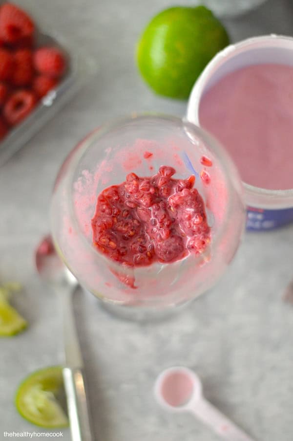 This 4 Ingredient Post-Workout Raspberry Lime Mocktail is simple to make, cool, and loaded with flavor. It's the best recovery drink after a hard workout!