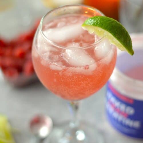 This 4 Ingredient Post-Workout Raspberry Lime Mocktail is simple to make, cool, and loaded with flavor. It's the best recovery drink after a hard workout!