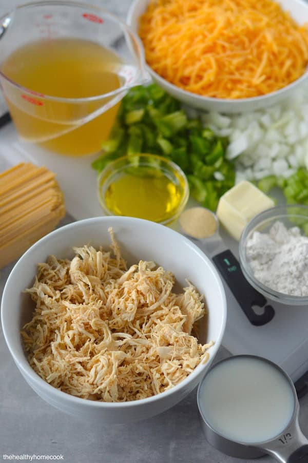 Creamy, cheesy, packed with flavor and PROTEIN — this lightened up Chicken Spaghetti is comfort food with a nutritious twist.